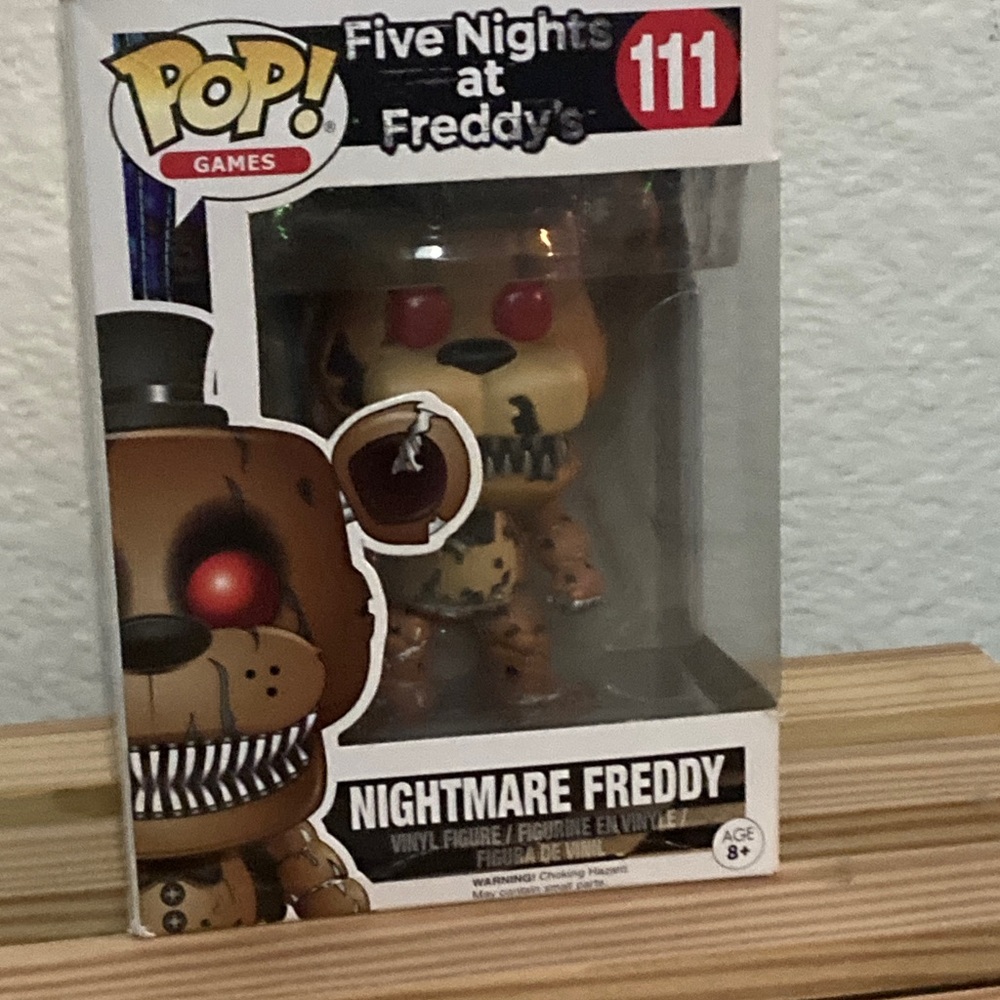 Funko Nightmare Freddy Figure with Red and Brown Accents